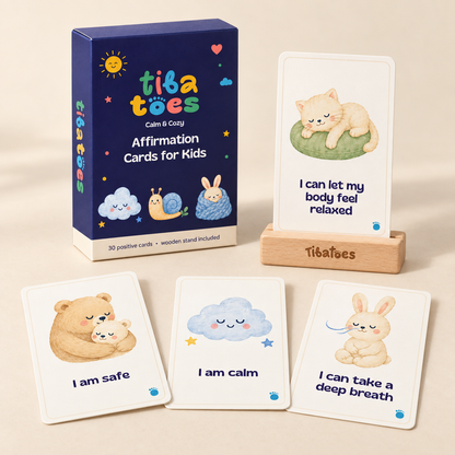Calm & Cozy affirmation deck with navy TibaToes box, four sample cards and wooden stand. Product design mockup.